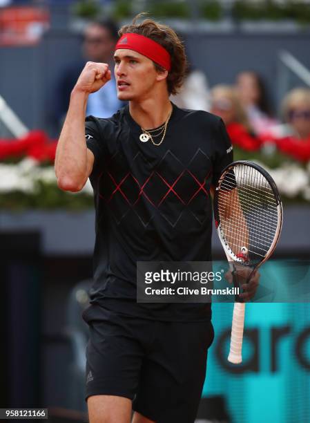 Alexander Zverev of Germany celebrates a point against Dominic Thiem of Austria in the mens final during day nine of the Mutua Madrid Open tennis...