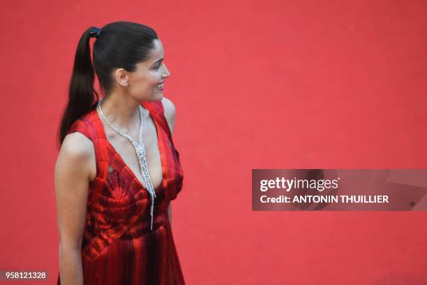 French model and actress Laetitia Casta poses as she arrives on May 13, 2018 for the screening of the film "Sink Or Swim " at the 71st edition of the...