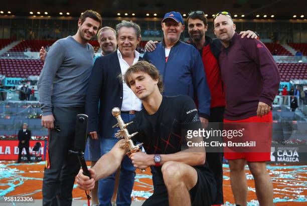 Alexander Zverev of Germany takes a selfie with his team and winners trophy after his straight sets victory against Dominic Thiem of Austria in the...