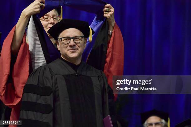 Author Tom Perrotta received an Honorary Doctor of Humane Letters degree at the Emerson College Undergaraduate Commencement Ceremony at Agganis Arena...