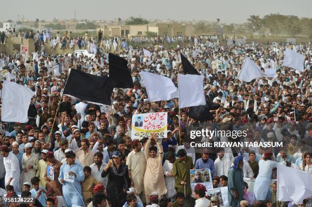 Supporters and activists of Pashtun Protection Movement wait for their leader Manzoor Pastheen during a protest rally in Karachi on May 13,2018. -...