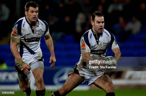 Sharks fly half Charlie Hodgson makes a run watched by Mark Cueto during the Heineken Cup Pool 5 Round 5 match between Cardiff Blues and Sale Sharks...