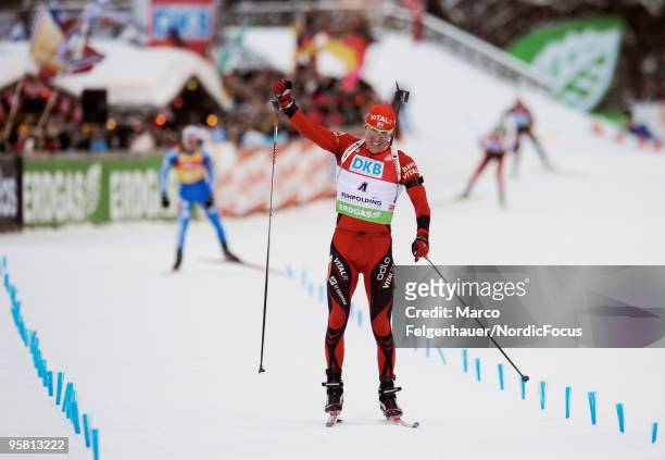 Emil Hegle Svendsen of Norway celebrates during the men's mass start in the e.on Ruhrgas IBU Biathlon World Cup on January 16, 2010 in Ruhpolding,...