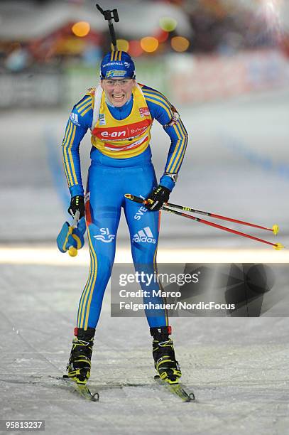 Helena Jonsson of Sweden smiles after winning the women's mass start in the e.on Ruhrgas IBU Biathlon World Cup on January 16, 2010 in Ruhpolding,...