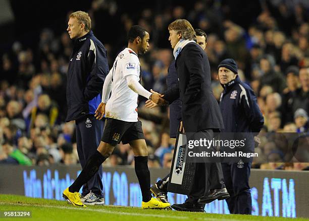 Robinho of Manchester City is substituted during the Barclays Premier League match between Everton and Manchester City at Goodison Park on January...