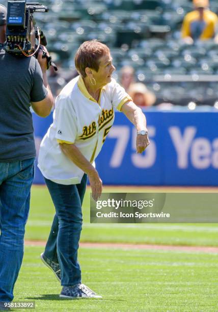 Peggy Lindsey pitches out the game ball on the same day that her grandson, Dallas Braden, pitched a perfect game in 2010 prior the MLB game between...