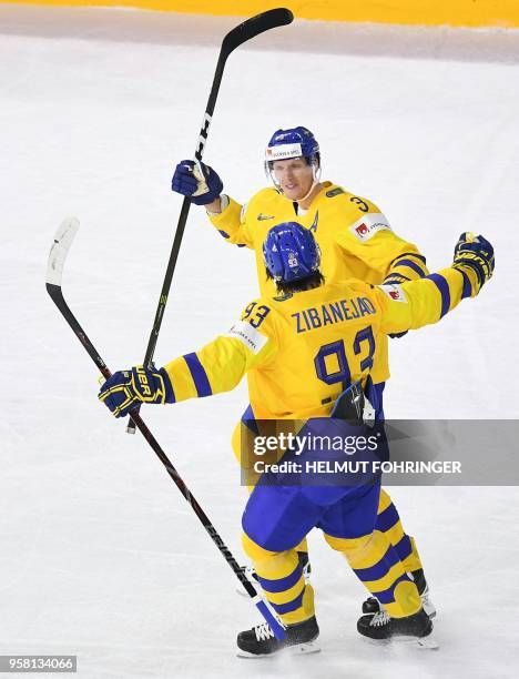 Sweden's John Klingberg and Mika Zibanejad celebrate afters scoring during the group A match Switzerland vs Sweden of the 2018 IIHF Ice Hockey World...