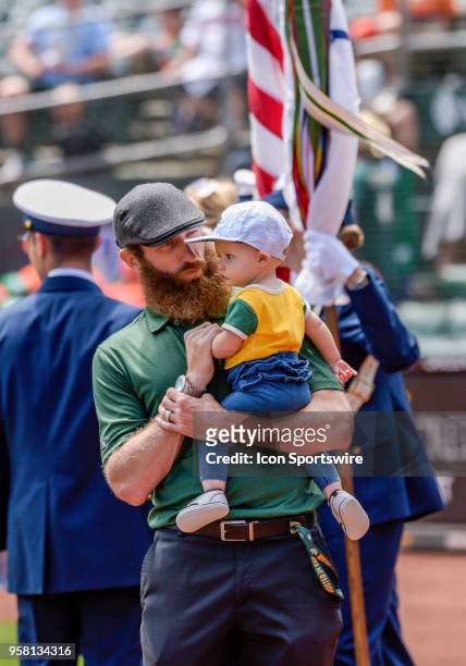Former Oakland Athletics pitcher, Dallas Braden spends time with his daughter, Kinsley Jo, before the game between the Houston Astros vs Oakland...