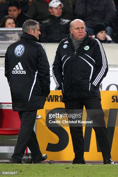 Head coach Armin Veh and manager Dieter Hoeness of Wolfsburg look dejected during the Bundesliga match between VfB Stuttgart and VfL Wolfsburg at the...