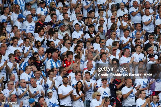 Fans of Huddersfield Town applaud Arsene Wenger head coach / manager of Arsenal on the twenty second minute to represent how many years he has...