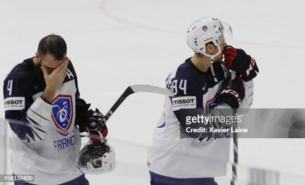 Antonin Manavian and Hecquefeuille of France are disapointerd after the defeat during the 2018 IIHF Ice Hockey World Championship Group A between...