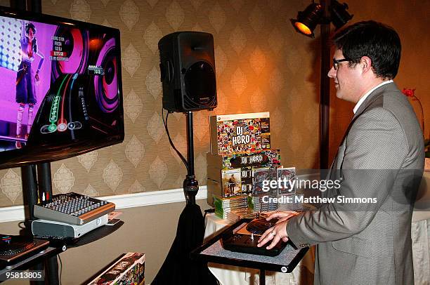 Actor Rich Sommer poses with the Activision display during the HBO Luxury Lounge in honor of the 67th annual Golden Globe Awards held at the Four...