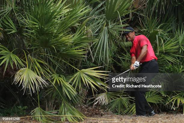 Tiger Woods of the United States plays his second shot on the second hole during the final round of THE PLAYERS Championship on the Stadium Course at...