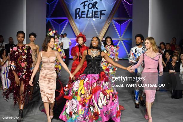 British model Naomi Campbell , Angolan model Maria Borges , US model Bella Hadid , Canadian model Winnie Harlow and Russian model Natalia Vodianova...