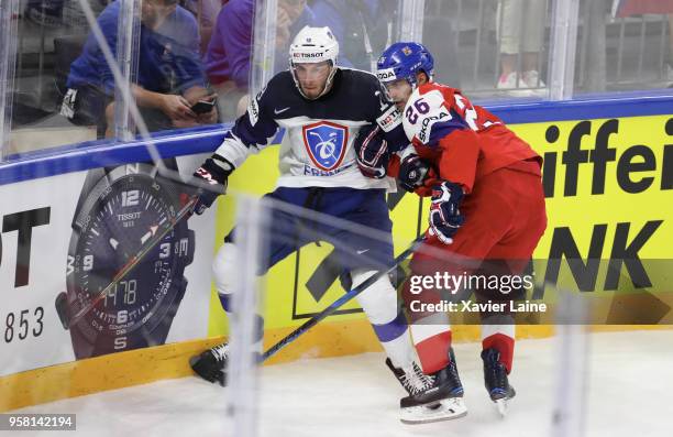 Michal Repik of Czech Republic in action with Yohann Auvitu of France during the 2018 IIHF Ice Hockey World Championship Group A between France and...