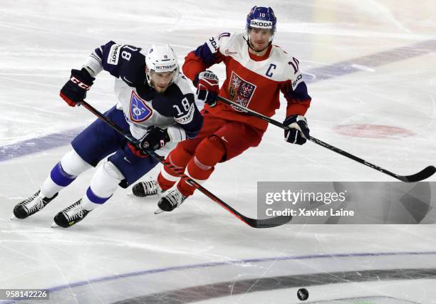 Captain Roman Cervenka of Czech Republic in action with Yohann Auvitu of France during the 2018 IIHF Ice Hockey World Championship Group A between...