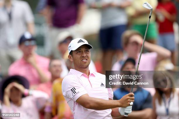 Xander Schauffele of the United States plays his tee shot on the par 3, third hole during the final round of the THE PLAYERS Championship on the...