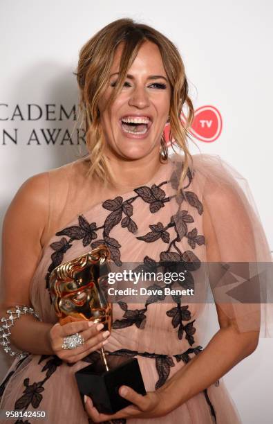 Caroline Flack poses with the award for Best Reality and Constructed Factual Series at the Virgin TV British Academy Television Awards at The Royal...