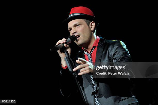 Roger Cicero performs on stage at the Lanxess-Arena on January 16, 2010 in Cologne, Germany.