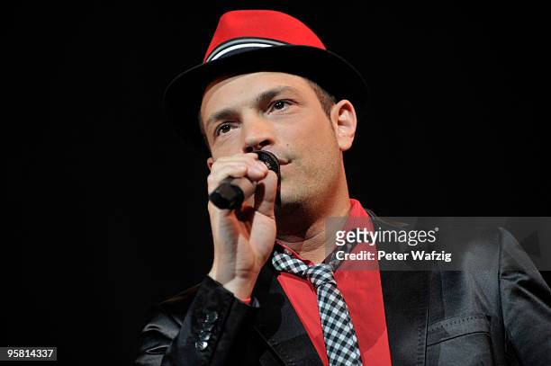 Roger Cicero performs on stage at the Lanxess-Arena on January 16, 2010 in Cologne, Germany.