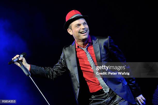 Roger Cicero performs on stage at the Lanxess-Arena on January 16, 2010 in Cologne, Germany.