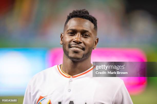 Pittsburg Steeler Antonio Brown throws out the first pitch before the game between the Miami Marlins and the Colorado Rockies at Marlins Park on...