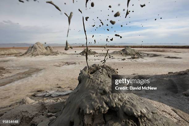 Mud flies as carbon dioxide gas from deep underground fissures escapes through geothermal mudpots, or mud volcanoes, over the southern San Andreas...