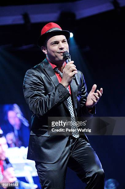 Roger Cicero performs on stage at the Lanxess-Arena on January 16, 2010 in Cologne, Germany.