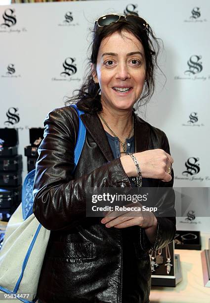 Actress Jane Adams poses at the Simmons Jewelry Company display during the HBO Luxury Lounge in honor of the 67th annual Golden Globe Awards held at...