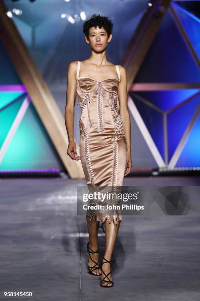 Dilone walks the Runway at Fashion for Relief Cannes 2018 during the 71st annual Cannes Film Festival at Aeroport Cannes Mandelieu on May 13, 2018 in...