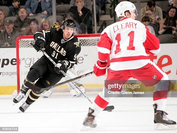 Brad Richards of the Dallas Stars skates against Daniel Cleary of the Detroit Red Wings on January 16, 2010 at the American Airlines Center in...