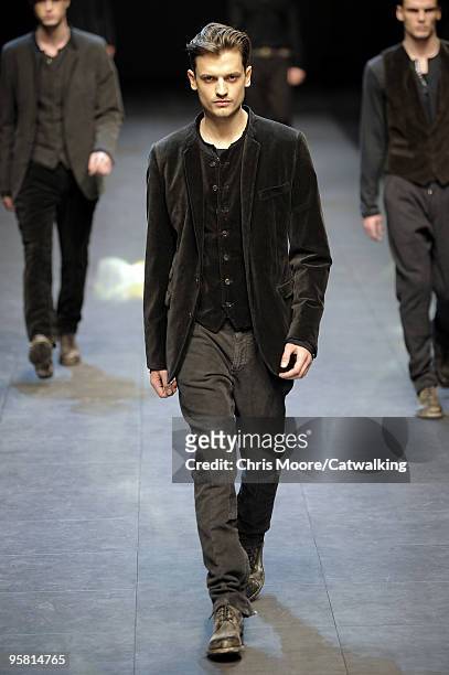 Model walks the runway during the Dolce & Gabbana Milan Menswear Autumn/Winter 2010 show on January 16, 2010 in Milan, Italy.