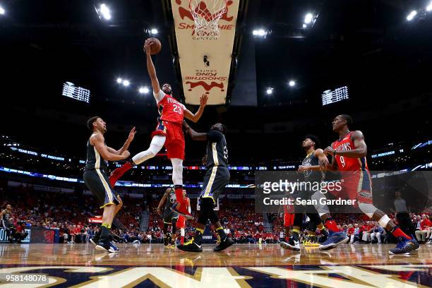 Anthony Davis of the New Orleans Pelicans shoots over Draymond Green during Game Four of the Western Conference Semifinals of the 2018 NBA Playoffs...