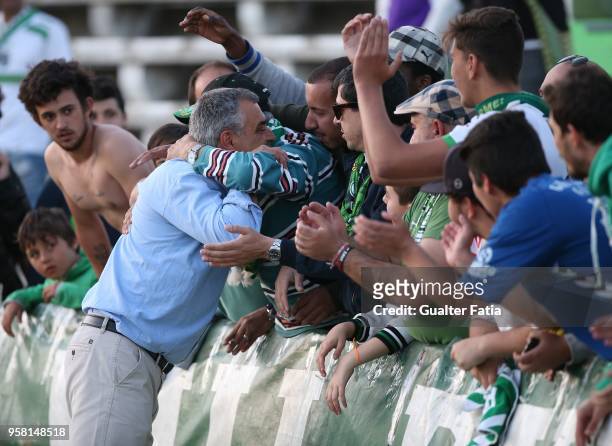 Vitoria Setubal head coach Jose Couceiro from Portugal celebrate with supporters after the victory at the end of the Primeira Liga match between...