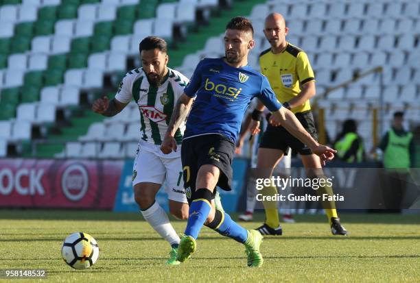 Tondela midfielder Bruno Monteiro from Portugal with Vitoria Setubal midfielder Joao Costinha from Portugal in action during the Primeira Liga match...