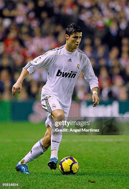 Cristiano Ronaldo of Real Madrid runs with the ball during the La Liga match between Athletic Bilbao and Real Madrid at the San Mames stadium on...