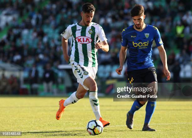 Vitoria Setubal forward Andre Pereira from Portugal with CD Tondela defender Jorge Fernando from Portugal in action during the Primeira Liga match...