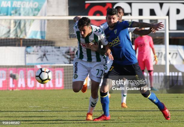 Vitoria Setubal forward Andre Pereira from Portugal with CD Tondela defender Joaozinho from Portugal in action during the Primeira Liga match between...