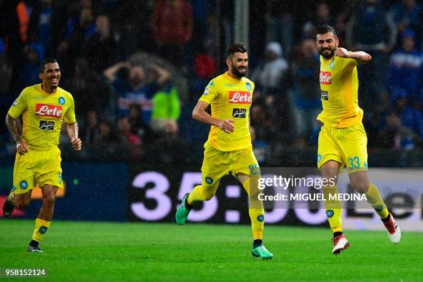 Napoli's defender from Spain Raul Albiol celebrates with teammate Napoli's defender from Albania Elseid Hysaj after scoring during the Italian Serie...