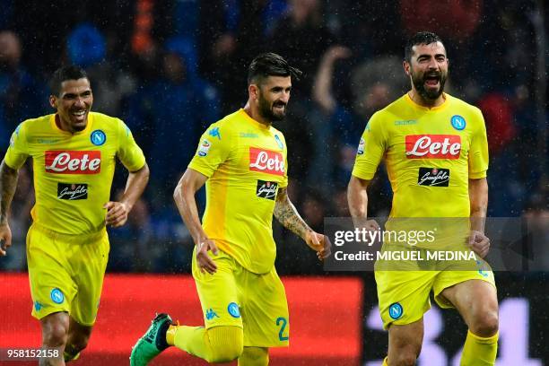 Napoli's defender from Spain Raul Albiol celebrates with teammate Napoli's defender from Albania Elseid Hysaj after scoring during the Italian Serie...