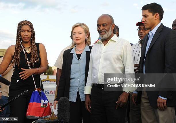 Secretary of State Hillary Clinton and Haitian President Rene Preval arrive to speak to the press after their meeting at Port-au-Prince's Toussaint...