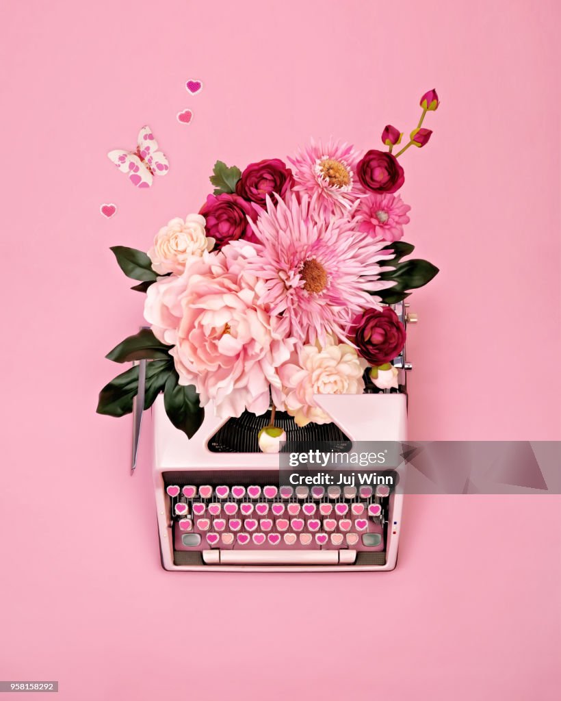 Vintage typewriter with flowers