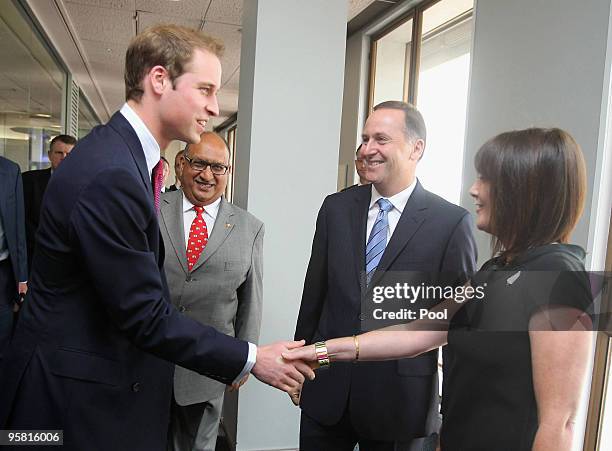 Prince William shakes hands with Bronagh Key as Prime Minister John Key and Governor General Anand Satyanand look on as he arrives at Auckland...