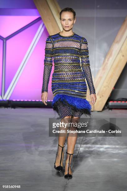 Natasha Poly walks the runway at Fashion For Relief Cannes 2018 during the 71st annual Cannes Film Festival at Aeroport Cannes Mandelieu on May 13,...