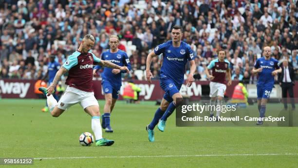 West Ham United's Marko Arnautovic scores his side's second goal during the Premier League match between West Ham United and Everton at London...