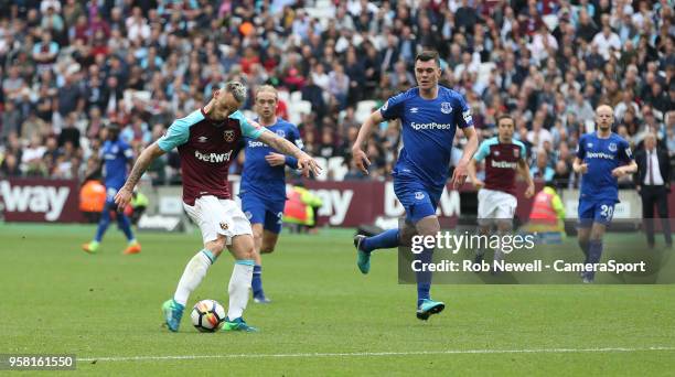 West Ham United's Marko Arnautovic scores his side's second goal during the Premier League match between West Ham United and Everton at London...