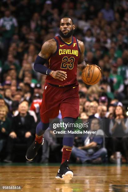 LeBron James of the Cleveland Cavaliers handles the ball on offense against the Boston Celtics during the first quarter in Game One of the Eastern...