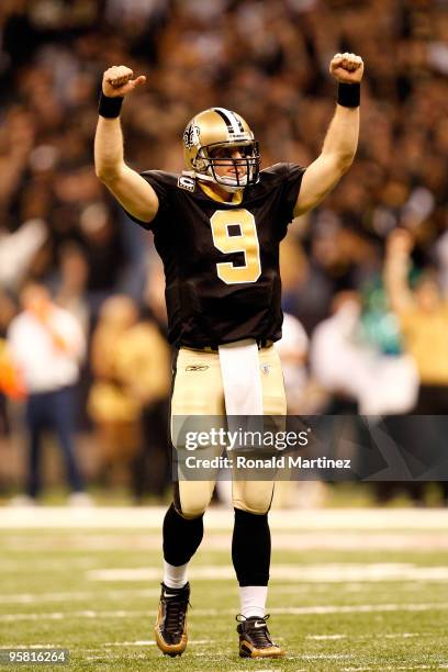 Drew Brees of the New Orleans Saints reacts in the first half against the Arizona Cardinals during the NFC Divisional Playoff Game at Louisana...