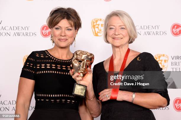 Presenter Kate Silverton and winner of the Fellowship award, Kate Adie pose in the press room at the Virgin TV British Academy Television Awards at...