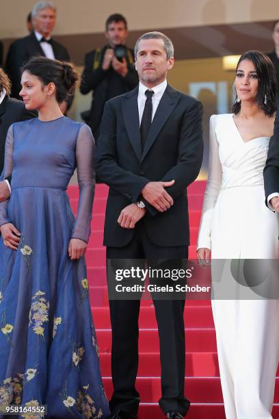 Noee Abita, Guillaume Canet and Leila Bekhti attend the screening of "Sink Or Swim " during the 71st annual Cannes Film Festival at Palais des...
